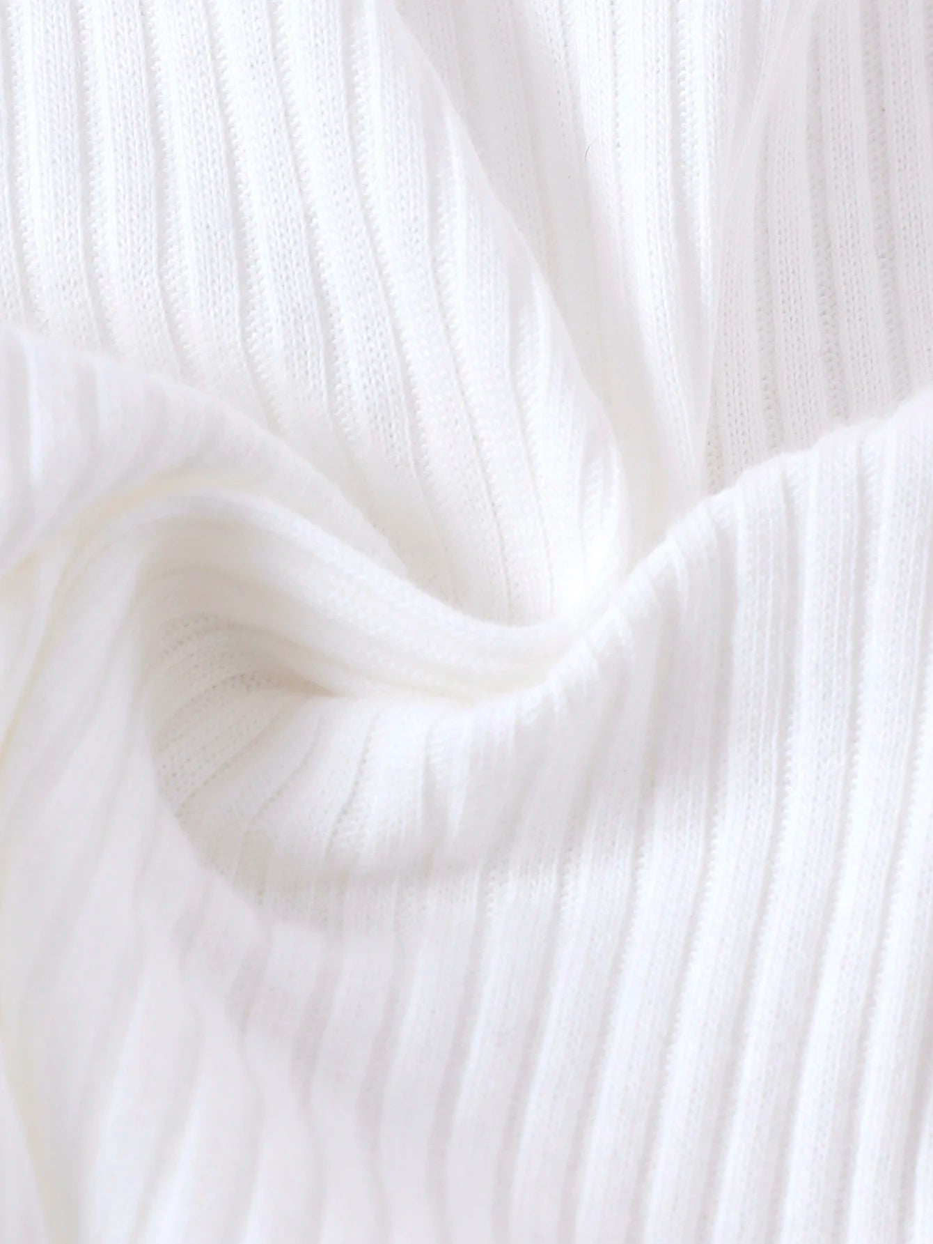 Close-up of white fabric with a soft texture